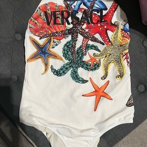 Versace girls swimsuit. Used one season excellent condition. Size 14/16